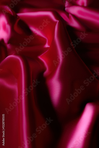 Luxurious silky fabric in deep magenta with elegant folds and soft lighting. Perfect for fashion design, textile backgrounds, branding, digital art, beauty aesthetics, romantic themes