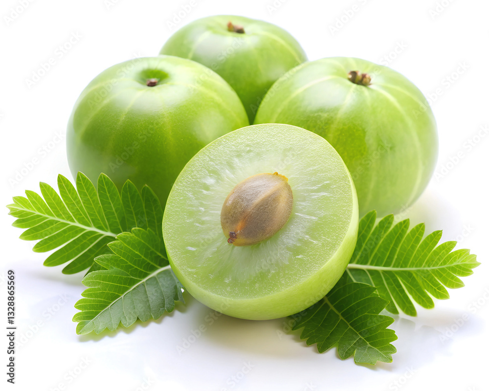 Obraz premium Fresh amla (Indian gooseberry) fruits with cut in half levitate isolated on white background.greenish yellow fruit with high vitamin c and health benefits in traditional ayurveda medicine