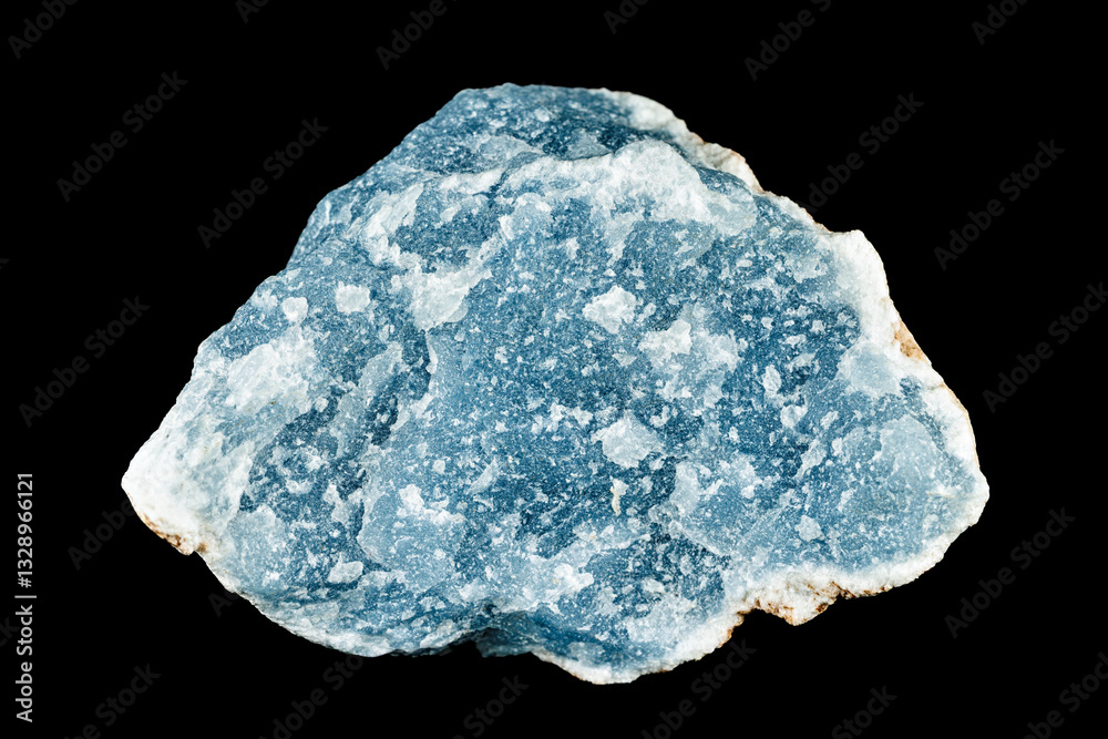 Raw angelite mineral specimen with a soft blue texture isolated on a black background.