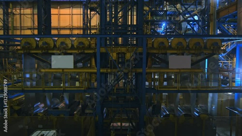 Rolling mill shop. Sheet metal galvanizing process. Rotating shafts.