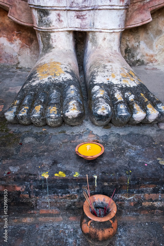 sukhothai historical park detail of buddha sculpture 