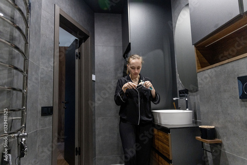 Wallpaper Mural Handsome young man trimming his beard with a trimmer Torontodigital.ca