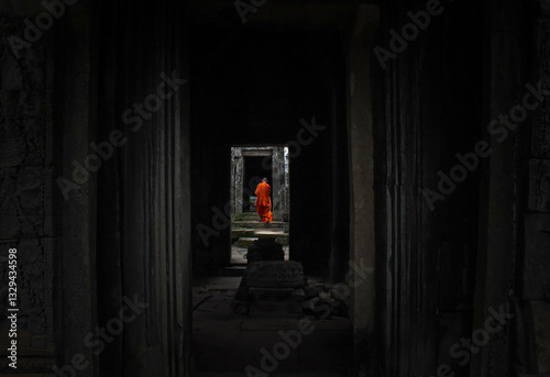 The walking monks into a temple of buddha
