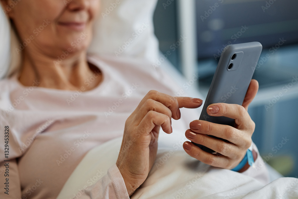 Elderly woman lying in bed smiling while using smartphone, wearing comfortable clothing and relaxing. She appears to be happy and content with her device in hand Elderly woman lying in bed smiling while using smartphone, wearing comfortable clothing and relaxing. She appears to be happy and content with her device in hand