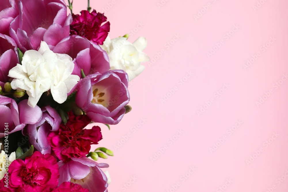 Fototapeta premium Beautiful bouquet of fresh flowers on a color background
