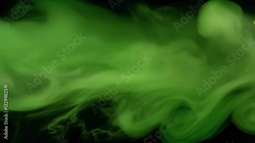 Abstract green smoke on black background, mysterious atmosphere, for visual effects, motion graphics background.