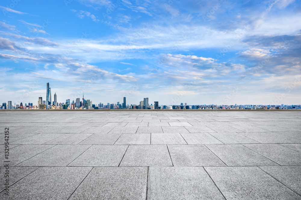 Fototapeta premium Empty stone floor and Shanghai cityscape with skyline at blue sky
