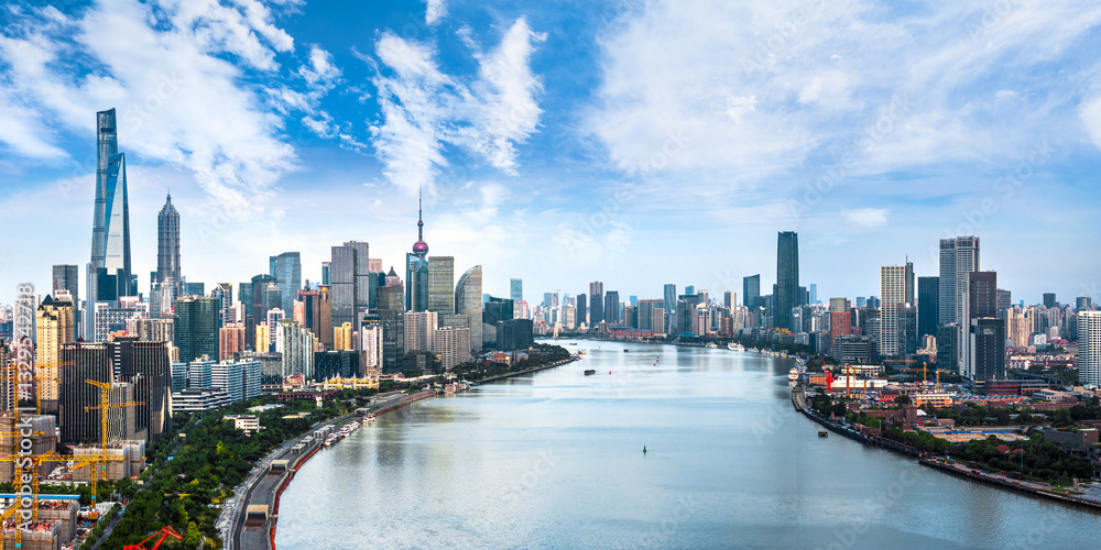 Fototapeta premium Panoramic aerial view of Shanghai skyline and Huangpu River