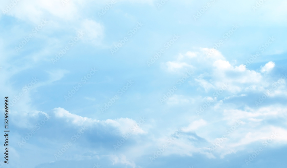 Obraz premium Blue pastel sky with white fluffy cloud. Cumulus clouds background. Cloudscape morning sky. The concepts of freedom of life, never give up and positive though energy.