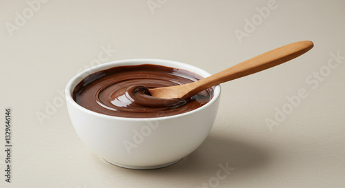 Bowl of Chocolate Spread with a Wooden Spoon – Neutral Background