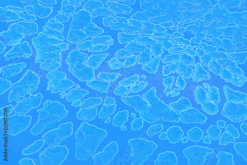 Blue is a mesmerizing abstract image of outer space. The destruction of the galaxy. The celestial constellation. Floating rocks, craters. Snowflake.  Sense of cosmic mystery and wonder.