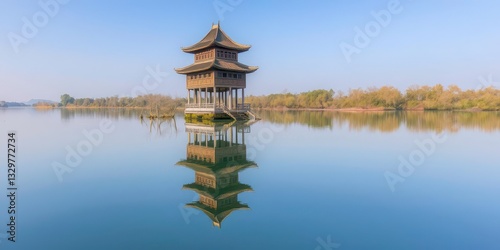  Dong Ethnic Drum Tower Reflecting in Calm Waters of Zhaoxing, Guizhou photo