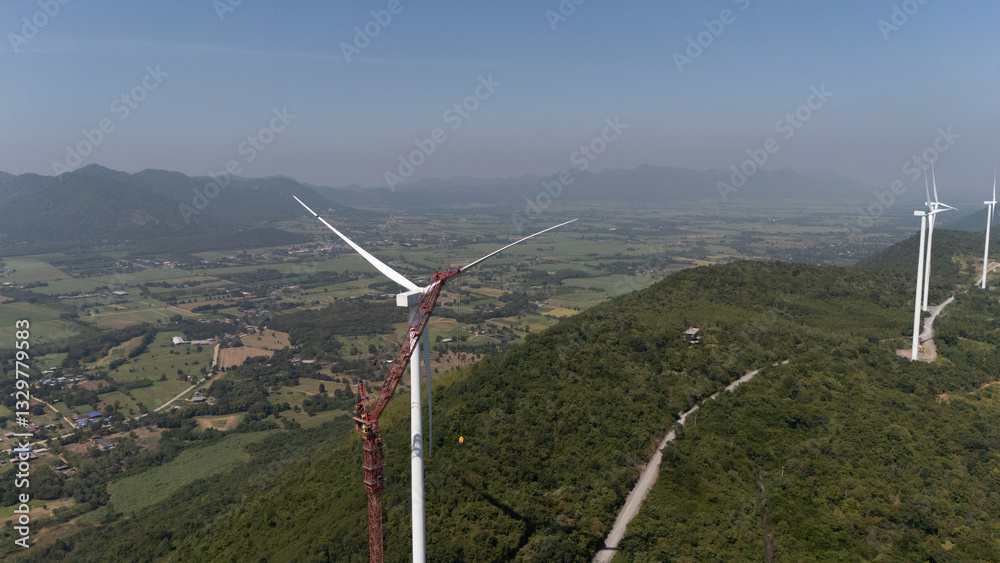 Wind turbines generate electricity at sunset in Europe and Asia