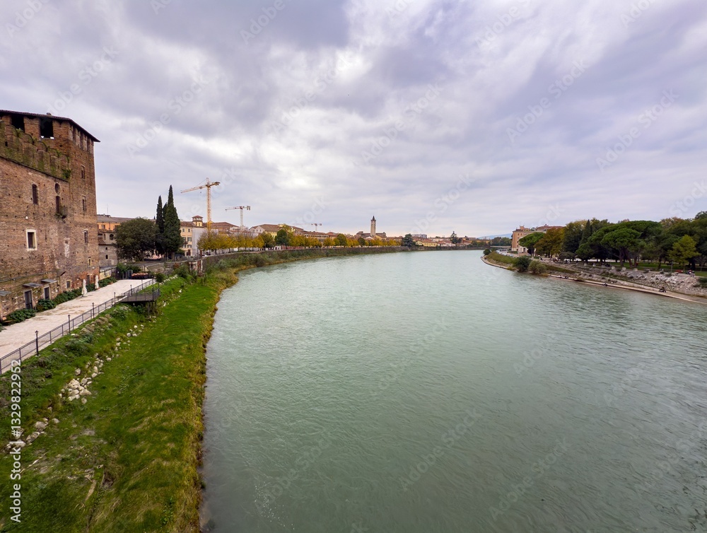 Cityscape of Verona city in Italy with Adige river and construction site