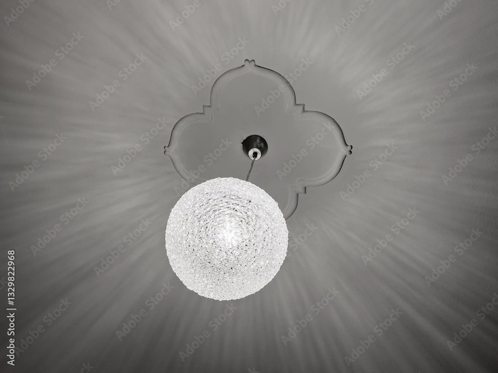 Modern round chandelier, light in room on ceiling