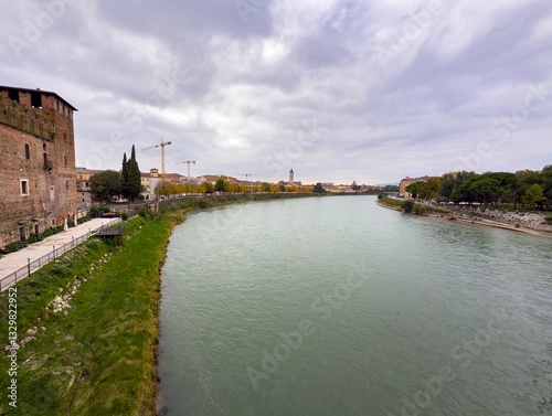 Obraz na płótnie Cityscape of Verona city in Italy with Adige river and construction site w salonie