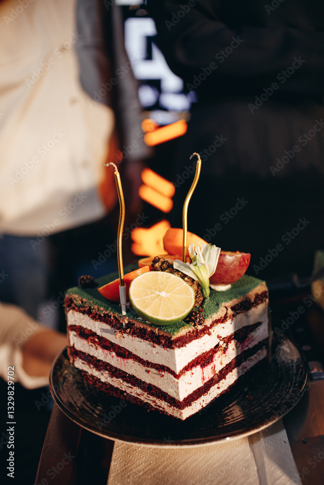 Waiter in white shirt bringing the ordered dessert and cup of coffee in a cafe