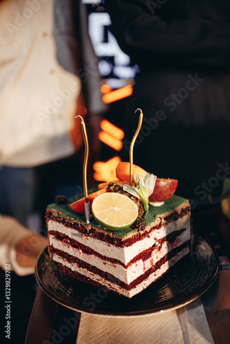 Obraz na płótnie Waiter in white shirt bringing the ordered dessert and cup of coffee in a cafe w salonie