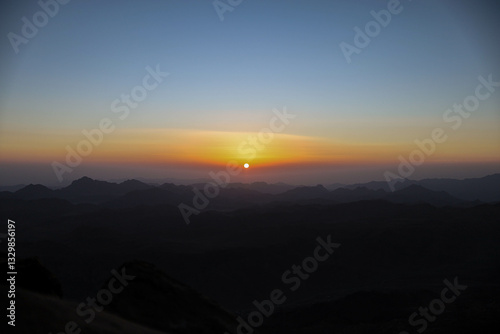 Beautiful orange sunrise in a rocky landscape