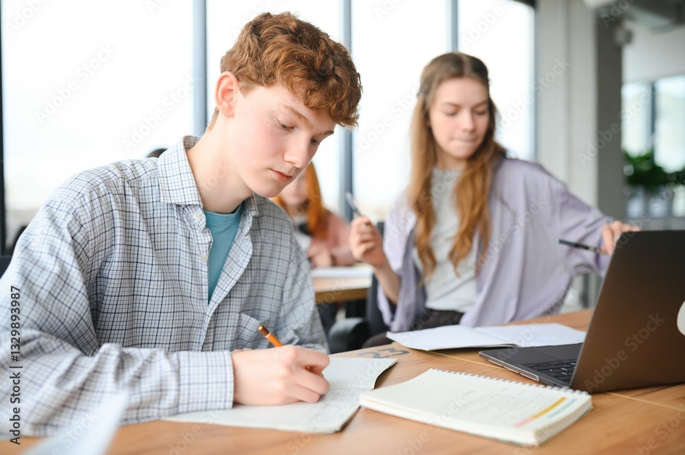 students sitting in a classroom, studying, discussing students sitting in a classroom, studying, discussing