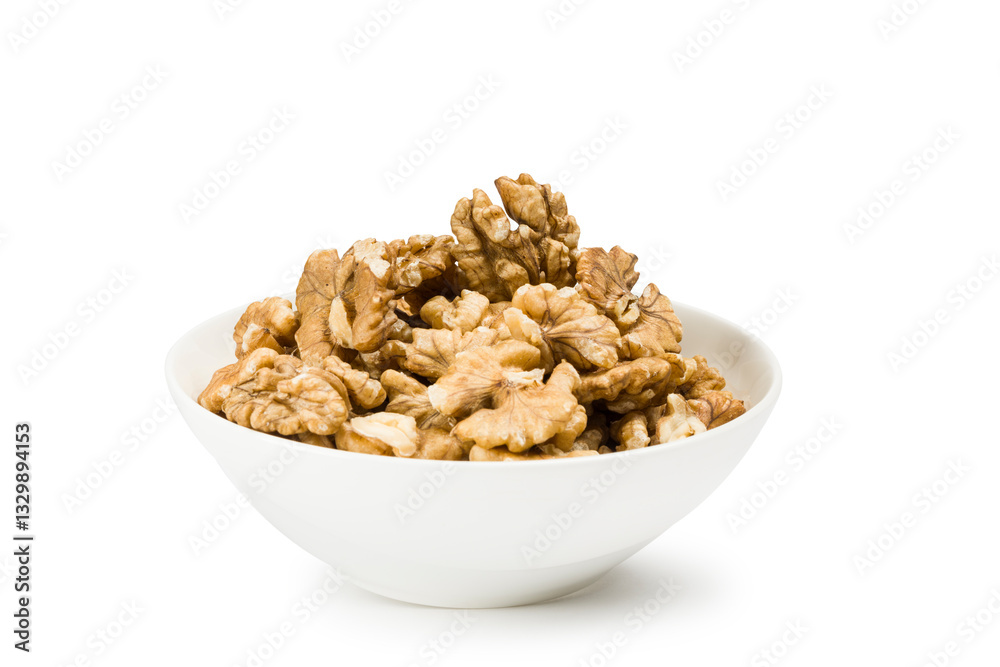 Shelled walnuts into bowl on white background. Shelled walnuts into bowl on white background.