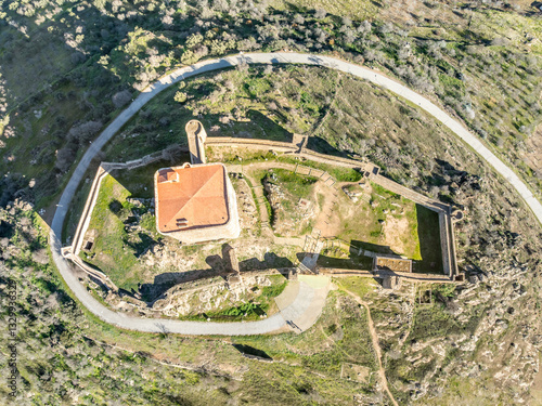 Obraz na płótnie Aerial ground plan view of Feria castle in Spain, Gothic and Mudéjar style buildings, square keep, blue sky background w salonie