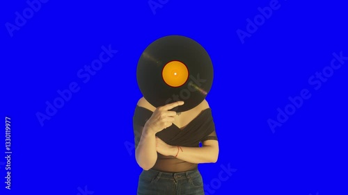 Woman Holding Vinyl Record With Blue Screen