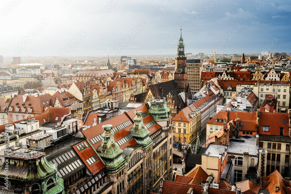 Obraz premium Medieval architecture of Wroclaw city in Poland, view from above to colourful roofs. Scenic old town in Europe.