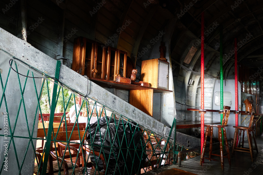 Naklejka premium El Avión, the world famous, must-see and be-seen restaurant and bar in Manuel Antonio, has a colorful and fascinating history. The C-123 Fairchild cargo plane has been converted into a pub 