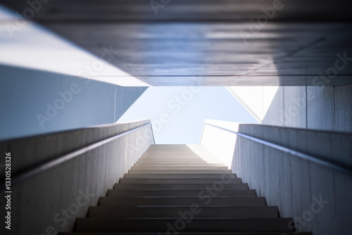 Modern Architectural Staircase Leading Upward into a Bright Sky