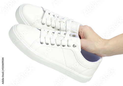 Wallpaper Mural Hand holding white sneakers shoelace on white background isolation Torontodigital.ca