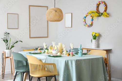 Festive table setting for Easter celebration in kitchen