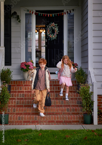 Happy Siblings Leaving Home for School on a Fresh Morning - Authentic Family Lifestyle and Back-to-School Moment in Suburban Neighborhood
