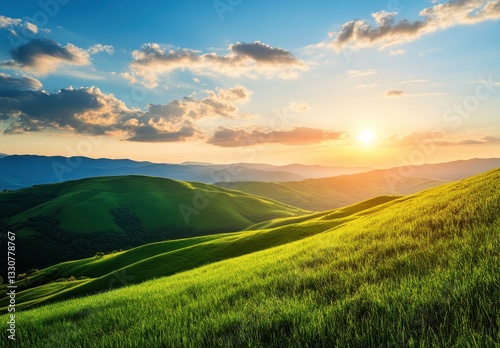Serene Sunrise Over Rolling Green Hills with Soft Light and Colorful Clouds Touching the Horizon in a Peaceful Landscape Setting