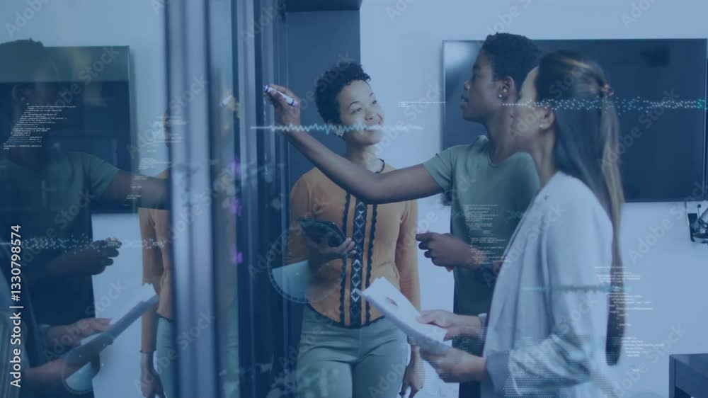 Collaborating on digital animation, diverse team analyzing data in modern office