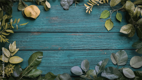 High-angle, close-up view of a flat lay composition.  The image features various autumnal leaves and a partially visible piece of fruit arranged in a border around a central, blank area on a