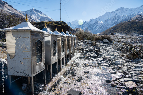 Water powered prayer wheel on the way to Kyangjin Kharka village in Langtang National park in Nepal. photo