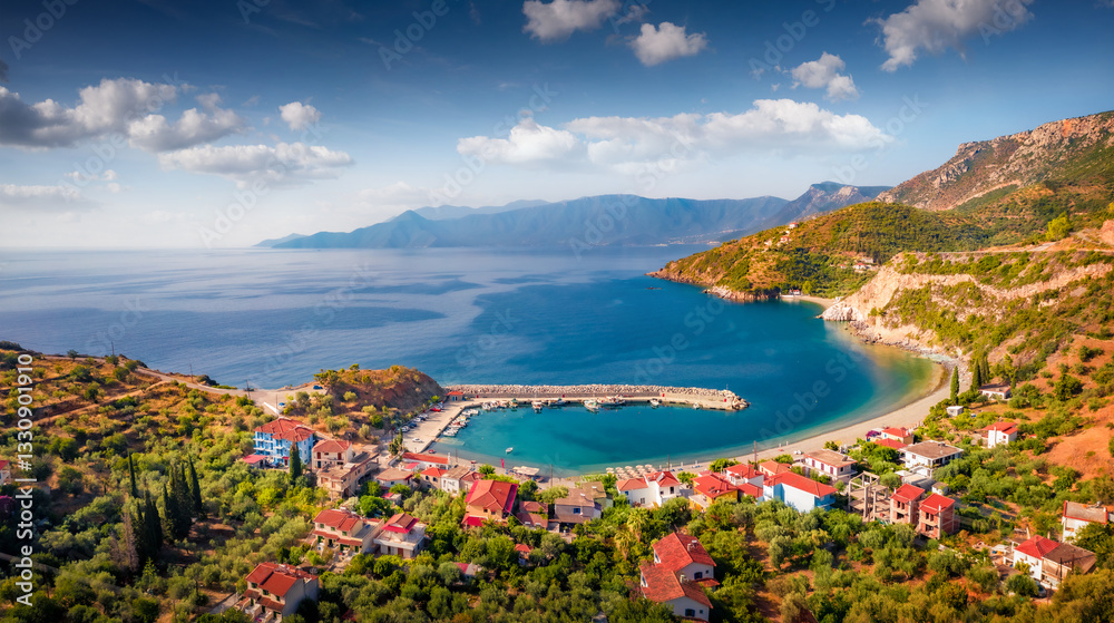 Sunny summer view from flying drone of Sampatiki beach. Colorful morning scene of Peloponnese peninsula, Greece, Europe. Beautiful morning seascape of Myrtoan Sea. Vacation concept background..