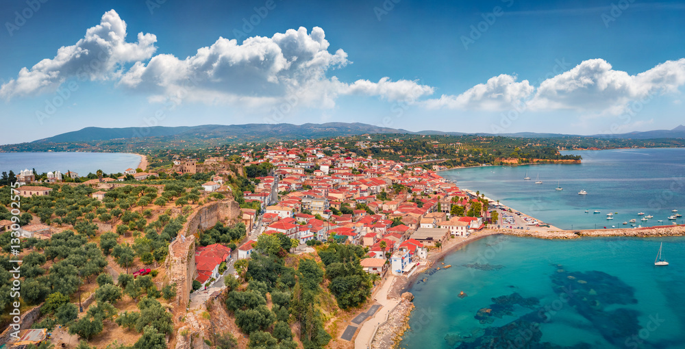 Exciting view from flying drone of Koroni town, Messenia, Peloponnese, Greece, Europe. Breathtaking morning seascape of Ionia sea. Traveling concept background.