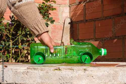 car made of recycled plastic bottle in la paz -bolivia latin america - recycling concept