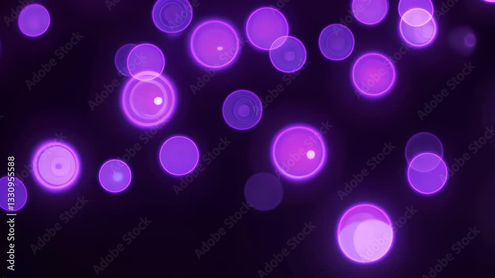 A mesmerizing display of purple bokeh lights creating a dreamy, blurred background effect. Ideal for design or artistic projects.