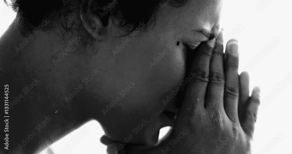 Intense Young African American in Mental Illness Struggle – Dramatic Monochromatic, Quiet Despair of 20s Girl Covering Face suffering from depression