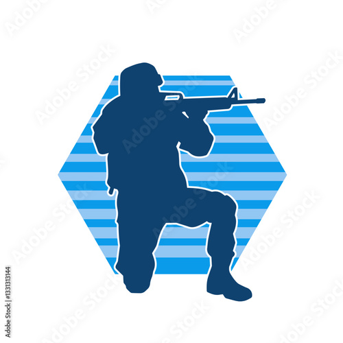 Silhouette of a male soldier carrying machine gun weapon. Silhouette of a sniper shooter in action.