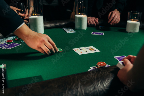 Obraz na płótnie People playing poker on a evening party, entertainment w salonie
