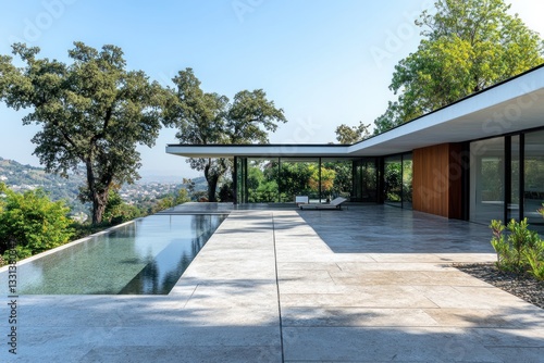 Modern villa with infinity pool and panoramic view.
