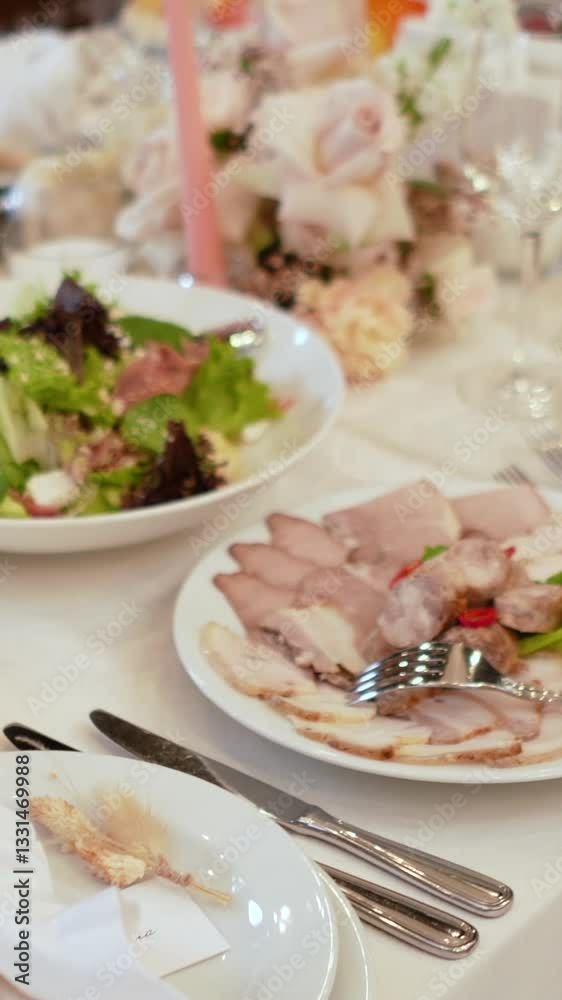 Catering service on banquet table with canape snacks in restaurant. Decorated food set on birthday, wedding celebration or business event venue. Many delicious dishes on the festive table, close-up Catering service on banquet table with canape snacks in restaurant. Decorated food set on birthday, wedding celebration or business event venue. Many delicious dishes on the festive table, close-up