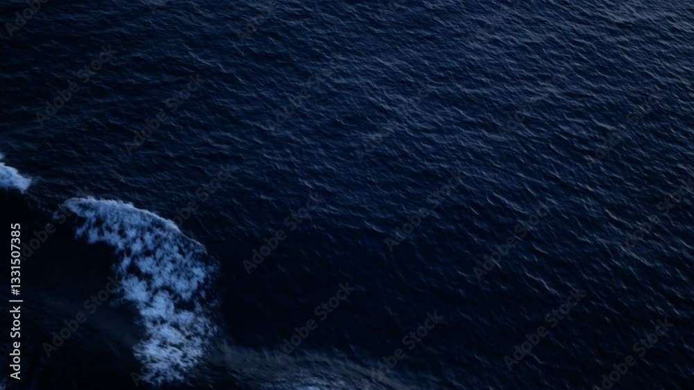 view to the waves rippling on water surface while cruising in the ocea sea in night dar time, wirling water while cruising, wave on sea water surface background in tropical sea.