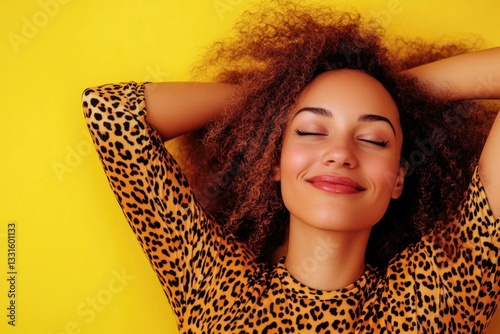 A woman lies down with her eyes closed, hands behind her head, suggesting relaxation or meditation photo