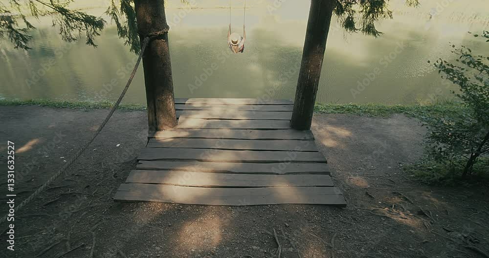 Woman Enjoying Nature on a Swing. Embraces lightness and freedom, surrounded by fresh air and greenery. Relaxation, happiness, connection to nature	