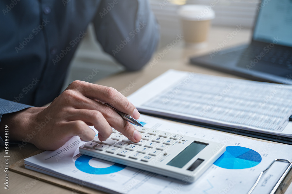 Accountant used a calculator financial analysis managing payroll tax accounting budget accounts. Accountant used a calculator financial analysis managing payroll tax accounting budget accounts.